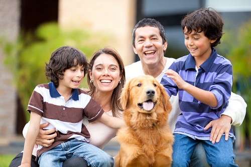 hispanic family group photo with dog